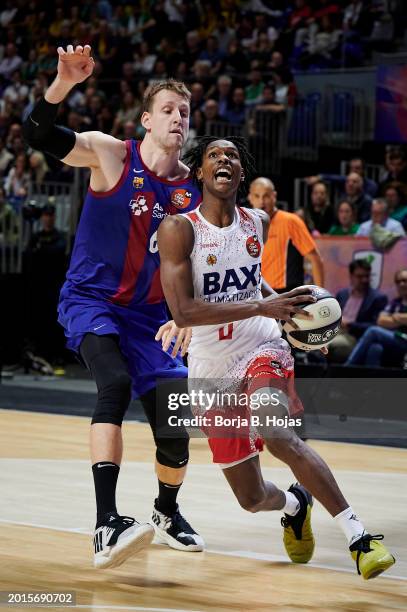 Jan Vesely of FC Barcelona and Brancou Badio of BAXI Manresa in action during Quarter Finals of Copa del Rey 2024 at Martin Carpena Arena on February...