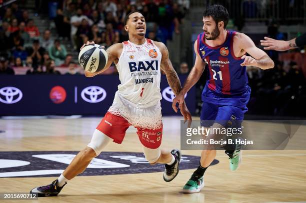 Alex Abrines of FC Barcelona and Travante Williams of BAXI Manresa in action during Quarter Finals of Copa del Rey 2024 at Martin Carpena Arena on...