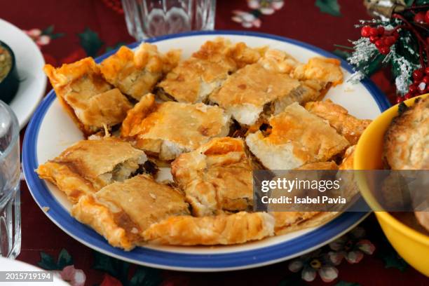 a plate of appetizers on festive table - puff pastry stock pictures, royalty-free photos & images
