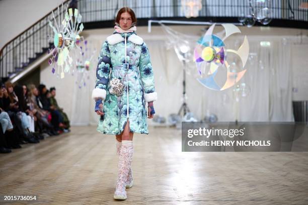 Model presents a creation by London-based designer Susan Fang during the Autumn/Winter 2024 collection catwalk presentation during London Fashion...