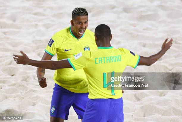 Mauricinho of Brazil celebrates with Catarino of Brazil after scoring a goal during the FIFA Beach Soccer World Cup UAE 2024 Group D match between...