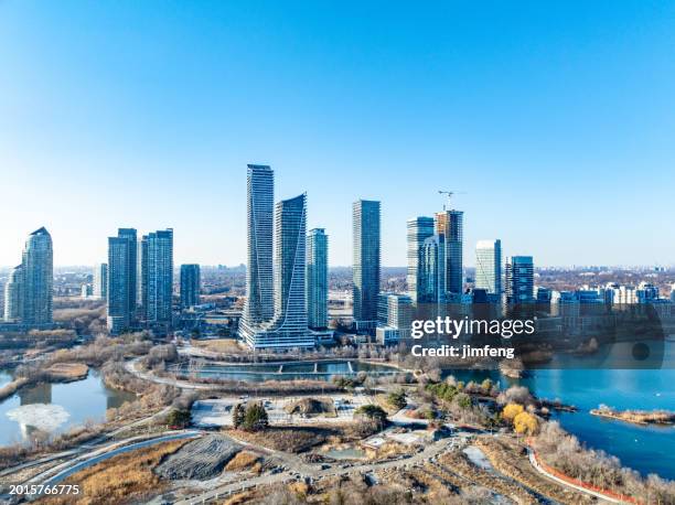 the view of humber bay shores skyline from waters of lake ontario, toronto, canada - etobicoke ontario stock pictures, royalty-free photos & images