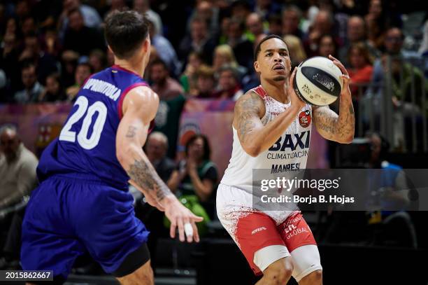 Nico Laprovittola of FC Barcelona and Travante Williams of BAXI Manresa in action during Quarter Finals of Copa del Rey 2024 at Martin Carpena Arena...