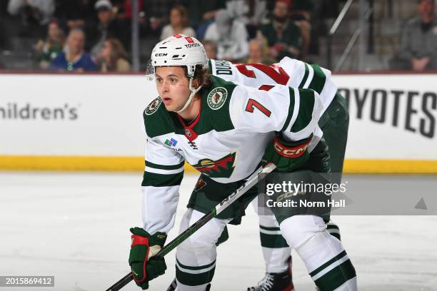 Brock Faber of the Minnesota Wild gets ready during a face off against the Arizona Coyotes at Mullett Arena on February 14, 2024 in Tempe, Arizona.