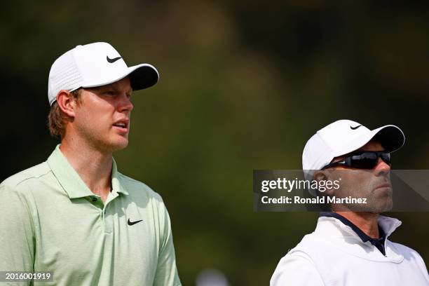 Cameron Davis of Australia and his caddie Andrew Tschudin on the sixth tee during the second round of The Genesis Invitational at Riviera Country...