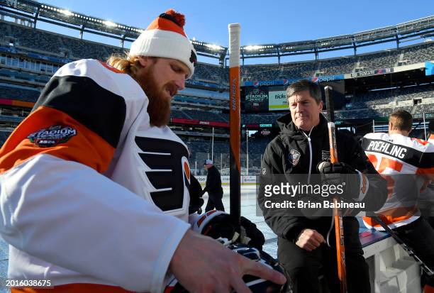Marc Staal of the Philadelphia Flyers works on his equipment before a team photo and practice at MetLife Stadium on February 16, 2024 in East...