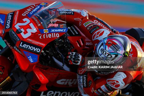 Ducati's Italian rider Enea Bastianini steers his bike on the first day of the MotoGP pre-season testing at Lusail International Circuit in Doha on...