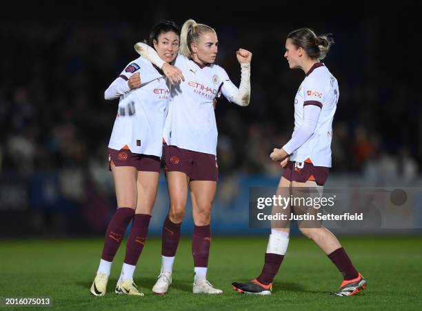 Leila Ouahabi, Alex Greenwood and Kerstin Casparij of Manchester City celebrate victory on the final whistle during the Barclays Women's Super League...