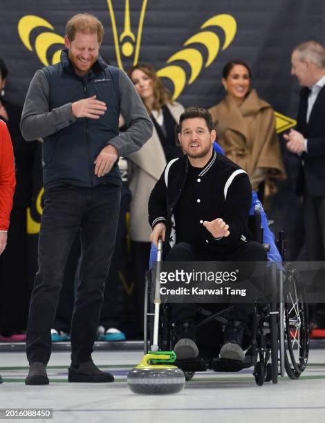 Prince Harry, Duke of Sussex, Meghan, Duchess of Sussex and Michael Bublé attend the Invictus Games One Year To Go Winter Training Camp at Hillcrest...