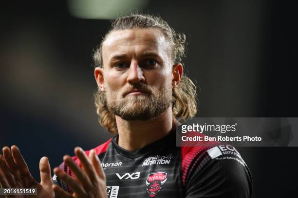 Chris Hankinson of Salford Red Devils applauds the away fans after the Betfred Super League match between Leeds Rhinos and Salford Red Devils at...
