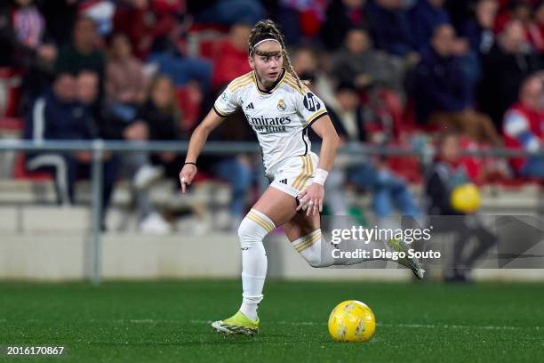 Athenea del Castillo of Real Madrid runs with the ball during Liga F match between Atletico de Madrid and Real Madrid at Wanda Sport Centre on...