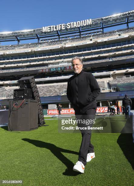 Head coach John Tortorella of the Philadelphia Flyers checks out the stadium prior to practice and the Stadium Series game at MetLife Stadium on...