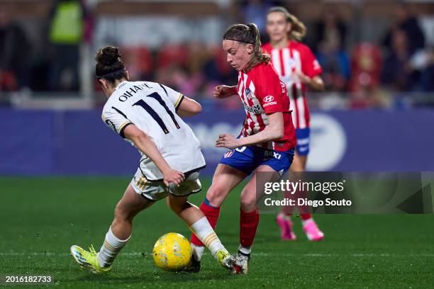 Eva Navarro of Atletico de Madrid battle for the ball with Oihane Hernandez of Real Madrid during Liga F match between Atletico de Madrid and Real...