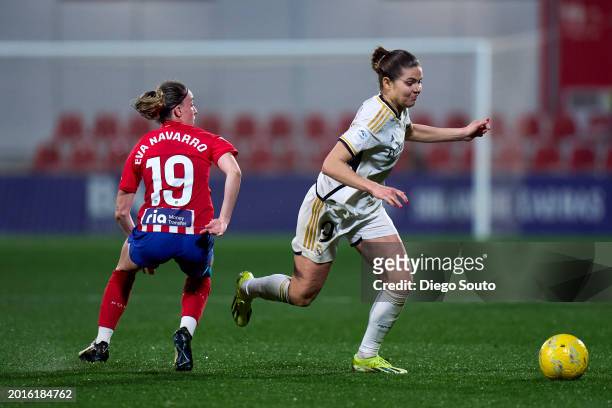 Eva Navarro of Atletico de Madrid battle for the ball with Signe Bruun of Real Madrid during Liga F match between Atletico de Madrid and Real Madrid...