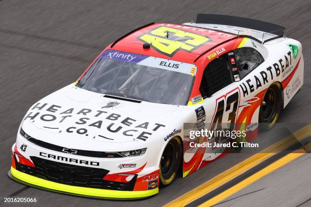 Ryan Ellis, driver of the Heartbeat Hot Sauce Co Chevrolet, drives during practice for the NASCAR Xfinity Series United Rentals 300 at Daytona...