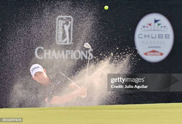Rob Labritz of the United States plays his shot from the bunker on the 18th hole during the first round of the Chubb Classic at Tiburon Golf Club on...