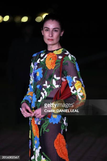 British model Erin O'Connor arrives to attend the catwalk presentation for British fashion house Burberry's Autumn/Winter 2024 collection, at London...