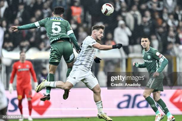 Utku Yuvakuran of Besiktas in action against Ugurcan Yazgili of TUMOSAN Konyaspor during the Turkish Super Lig week 26 football match between...