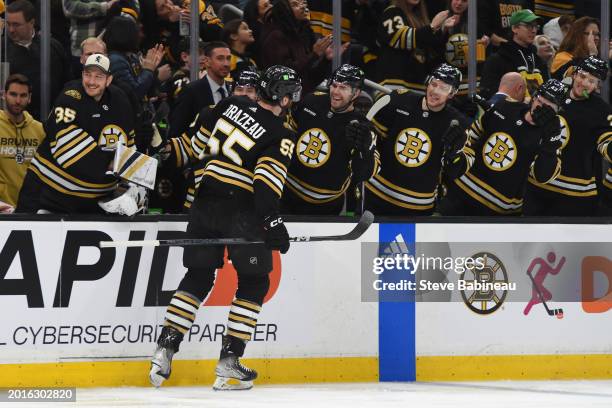 Justin Brazeau of the Boston Bruins celebrates his second-period goal against the Dallas Stars at the TD Garden on February 19, 2024 in Boston,...