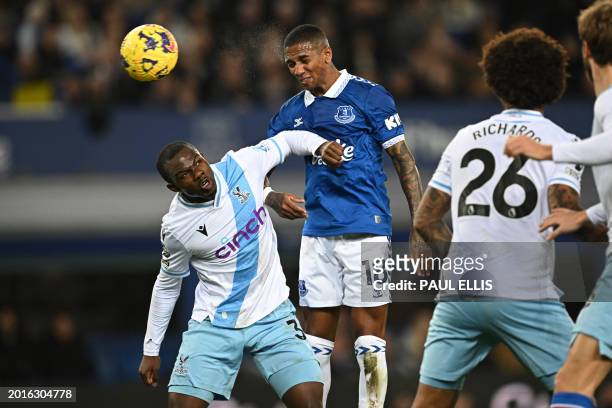 Everton's English defender Ashley Young wins a header during the English Premier League football match between Everton and Crystal Palace at Goodison...