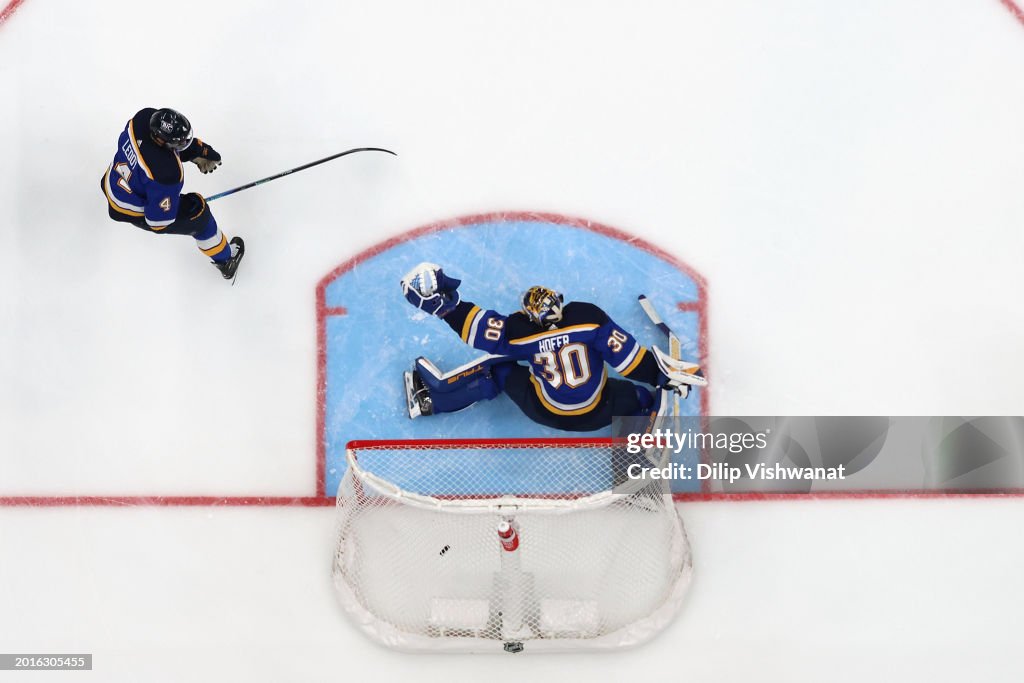 Joel Rabel Toronto Joel Hofer of the St. Louis Blues allows a goal against the Toronto ...