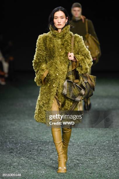 Model on the runway at Burberry RTW Fall 2024 as part of London Ready to Wear Fashion Week held at Victoria Park on February 19, 2024 in London,...