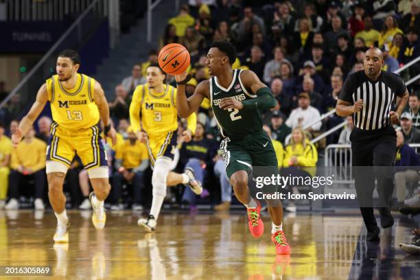 Michigan State Spartans guard Tyson Walker brings the ball up the court during a regular season Big Ten Conference college basketball game between...