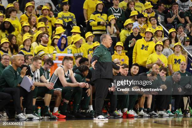 Michigan State Spartans head coach Tom Izzo reacts to a play on the court during a regular season Big Ten Conference college basketball game between...