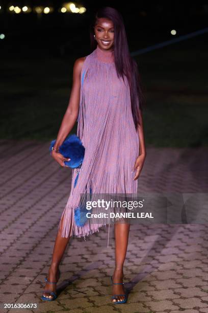 British model Leomie Anderson arrives to attend the catwalk presentation for British fashion house Burberry's Autumn/Winter 2024 collection, at...