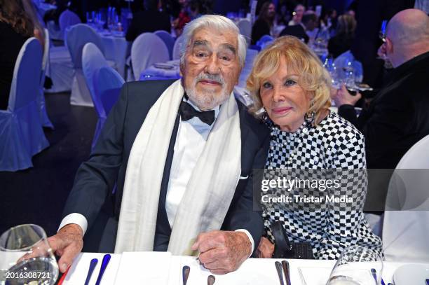 Mario Adorf and Monique Faye attend the Cinema For Peace Gala 2024 on the occasion of the 74th Berlinale International Film Festival Berlin at WECC -...