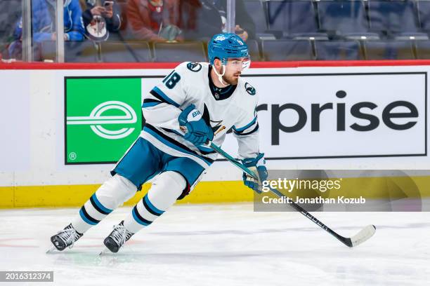 Filip Zadina of the San Jose Sharks takes part in the pre-game warm up prior to NHL action against the Winnipeg Jets at Canada Life Centre on...