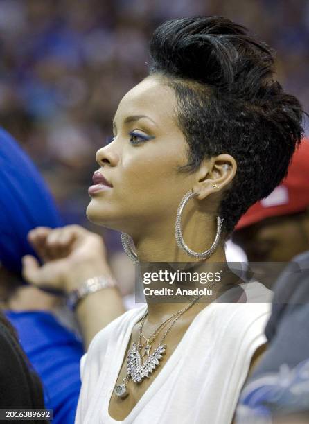 File photo dates June 12, 2009 shows world famous singer Rihanna watches the fourth game basketball match between Lakers and Magic-Los Angeles at the...