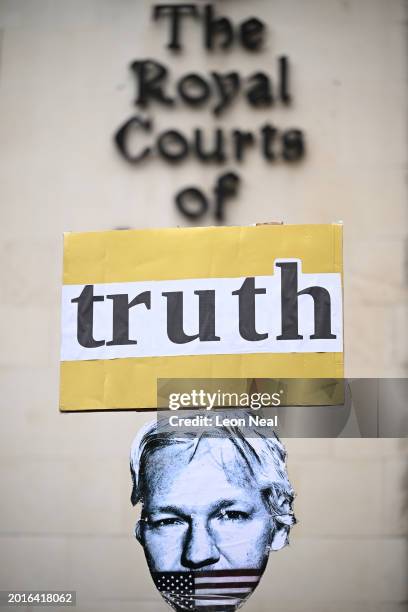 Placard reading "truth" is held up as supporters of WikiLeaks founder Julian Assange gather outside the Royal Courts of Justice on February 20, 2024...