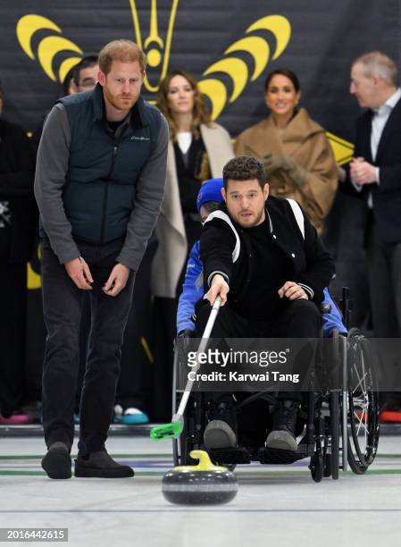Prince Harry, Duke of Sussex, Luisana Lopilato, Michael Bublé and Meghan, Duchess of Sussex attend the Invictus Games One Year To Go Winter Training...