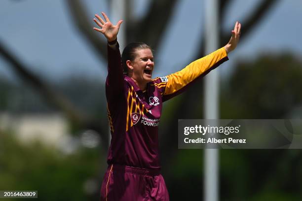 Jess Jonassen of Queensland celebrates dismissing Amy Edgar of Western Australia during the WNCL match between Queensland and Western Australia at...