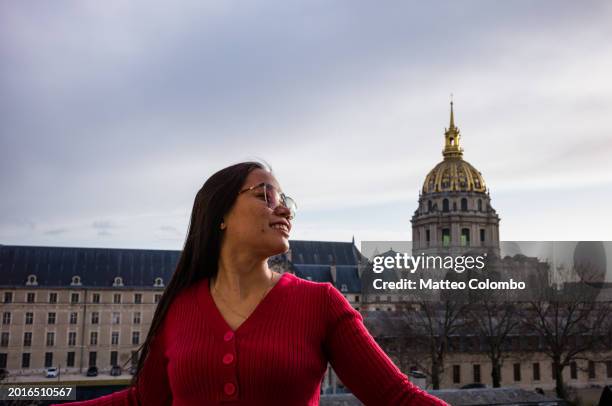 asian woman enjoying the vacation in paris, france - hotel des invalides stock pictures, royalty-free photos & images