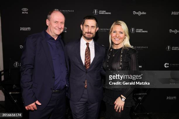 Henning Molfenter, Clemens Schick and Ashley Rice attend the Cinespace x Studio Babelsberg Night celebrating the 74th Berlinale International Film...