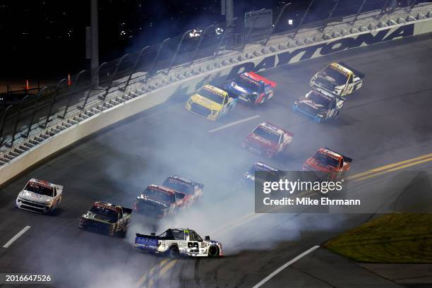 Ben Rhodes, driver of the Ranch Fuel Energy Drink Ford, spins after an on-track incident during the NASCAR Craftsman Truck Series Fresh from Florida...