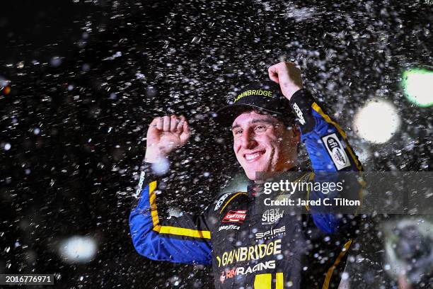 Nick Sanchez, driver of the Gainbridge Chevrolet, celebrates in victory lane after winning the NASCAR Craftsman Truck Series Fresh from Florida 250...