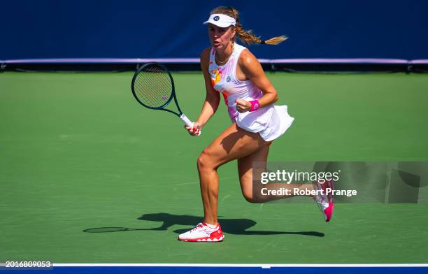 Magdalena Frech of Poland in action against Petra Martic of Croatia in the women's singles second round match on Day 3 of the Dubai Duty Free Tennis...