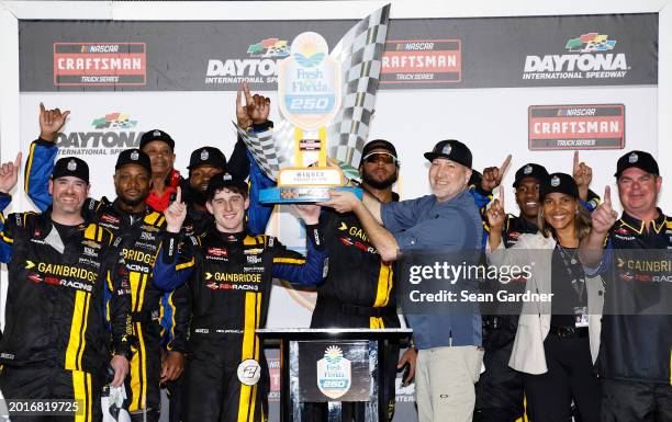 Nick Sanchez, driver of the Gainbridge Chevrolet, and crew celebrate in victory lane after winning the NASCAR Craftsman Truck Series Fresh from...