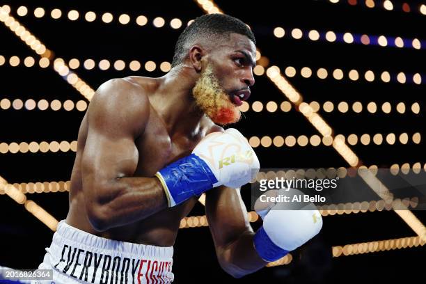 Abraham Nova looks on with blood in his beard against O’Shaquie Foster during their WBC Junior Lightweight World title fight at The Theatre at...