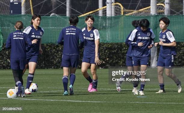 Japan women's national football team players train in Chiba, near Tokyo, on Feb. 20 four days ahead of the first leg of their two final Paris Olympic...