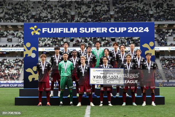Vissel Kobe players poses for photographs afte the FUJIFLIM SUPER CUP match between Vissel Kobe and Kawasaki Frontale at Japan National Stadium on...