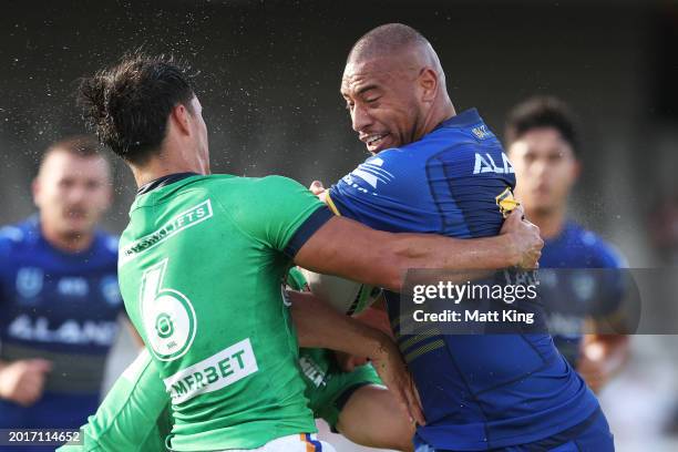 Ofahiki Ogden of the Eels is tackled during the NRL Pre-season challenge match between Parramatta Eels and Canberra Raiders at Netstrata Jubilee...