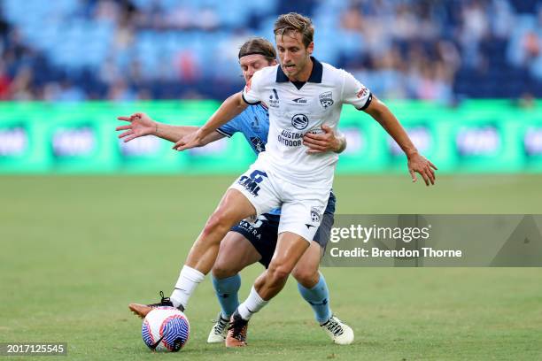 Stefan Mauk of Adelaide competes with Luke Brattan of Sydney during the A-League Men round 17 match between Sydney FC and Adelaide United at Allianz...