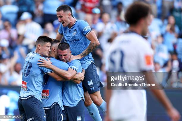 Robert Mak of Sydney celebrates scoring a goal with team mates during the A-League Men round 17 match between Sydney FC and Adelaide United at...