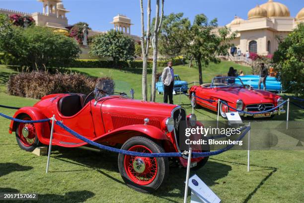 Fiat Balilla vehicle, left, and a 1958 Mercedes-Benz 300SL vehicle displayed during the Oberoi Concours d'Elegance in Udaipur, Rajasthan, India, on...