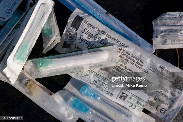 Pile of single use syringes and other accoutrement on 9th January 2024 in Birmingham, United Kingdom. These items were found in an area which is...