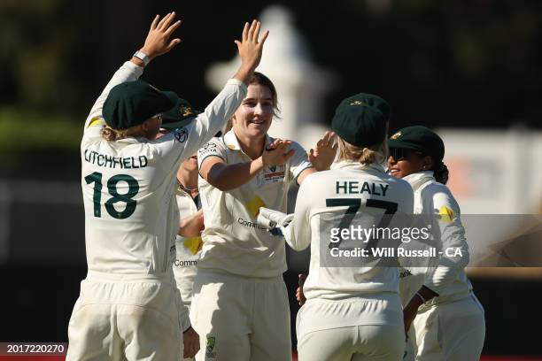 Annabel Sutherland of Australia celebrates after taking the wicket of Nonkululeko Mlaba of South Africa during day three of the Women's Test Match...